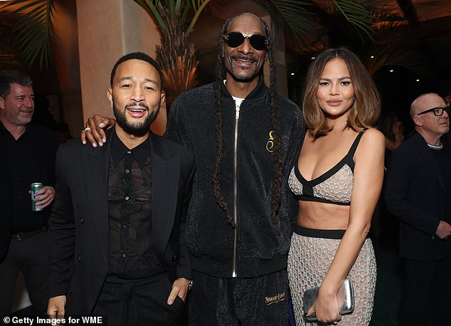 Snoop also posed with John Legend and his wife Chrissy Tiegen